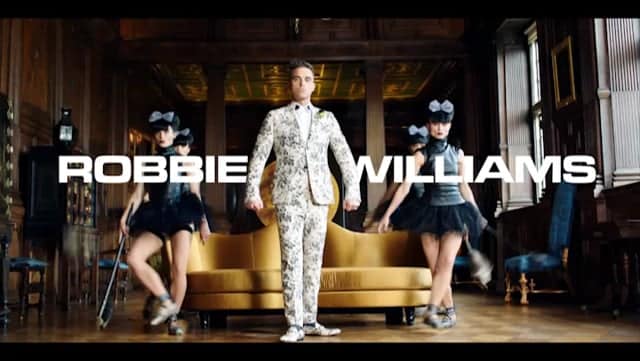 voix off spot disque Robbie Williams